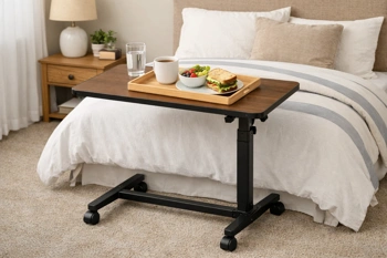 Five rolling tables that bring independence and comfort to bedside meals, hobbies, and reading.