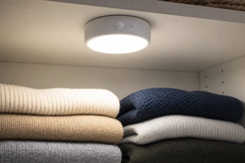 Motion sensor lights that eliminate fumbling in the dark and reduce fall risk in closets.
