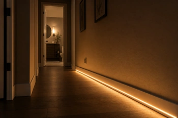 Low-level lighting keeps night vision intact and reduces disorientation during bathroom trips.