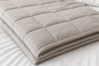 Find the right weighted blanket to help ease nighttime anxiety for your parent with dementia.